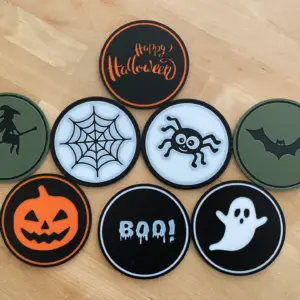 Eight Halloween coasters: Happy Halloween, witch, spider web, spider, bat, pumpkin, BOO! and ghost